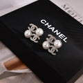 CHANEL Pearl Embrace CC Stud Earrings